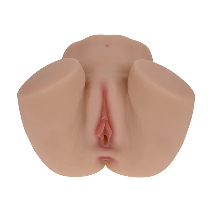 Skin-tone dual-entry masturbator with two rounded ends, central opening detail