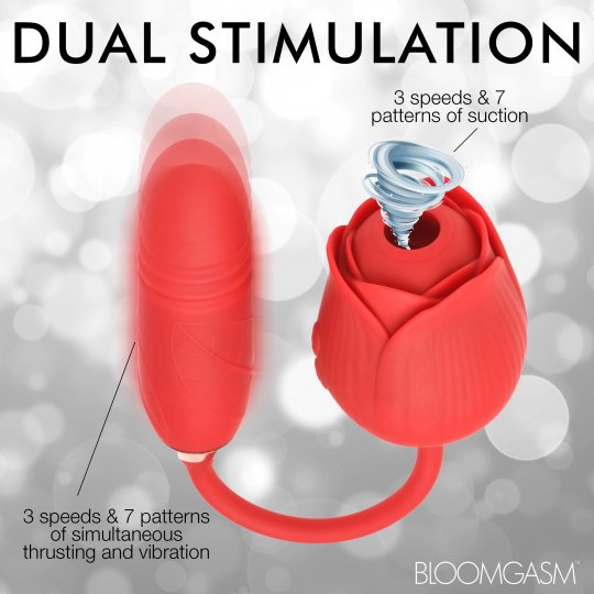 The Midnight Rose red silicone rose massager with two suction tips on corded wand