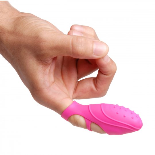 Pink handheld silicone massager with textured ridged grip and rounded tip