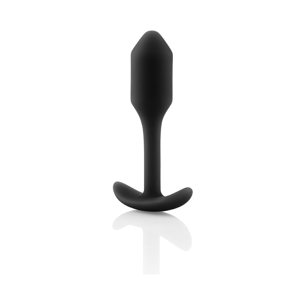 Black silicone anal plug with rounded base and short tapered tip