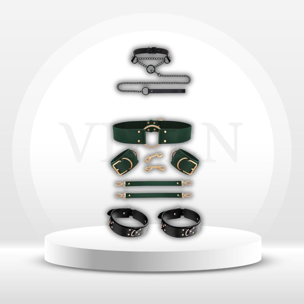 Restraint set with green straps, black cuffs, and silver chain collar and leashes