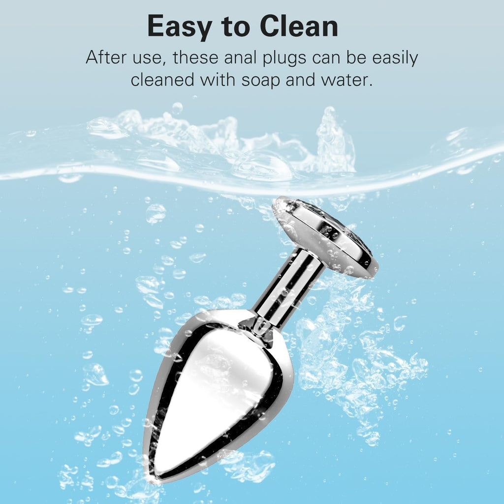 Chrome anal plug with crystal-like tip shown above water splashes