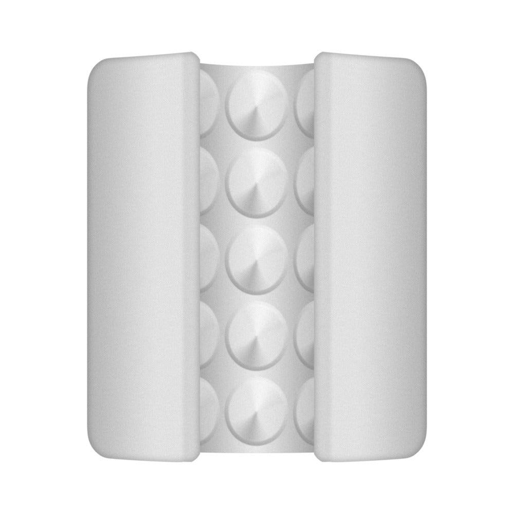 White silicone piece with two side walls and circular knob texture inside