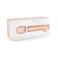 Petite rechargeable vibrating massager with rose gold handle and silicone tip