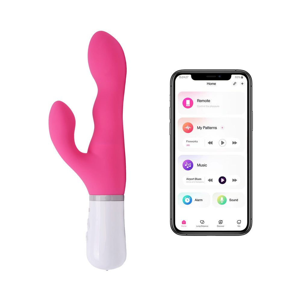 Pink rabbit vibrator beside smartphone showing app remote controls