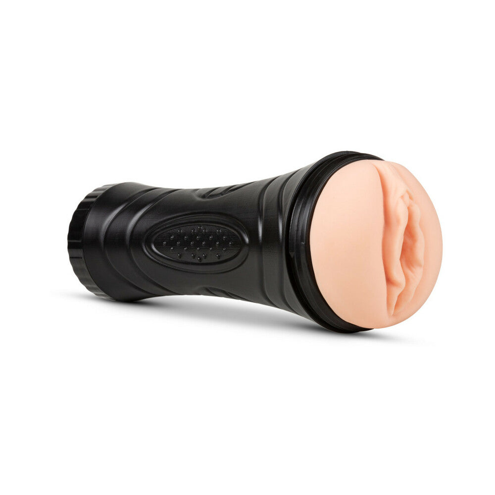 Black pleasure toy with beige insert sleeve end; side view on white background.