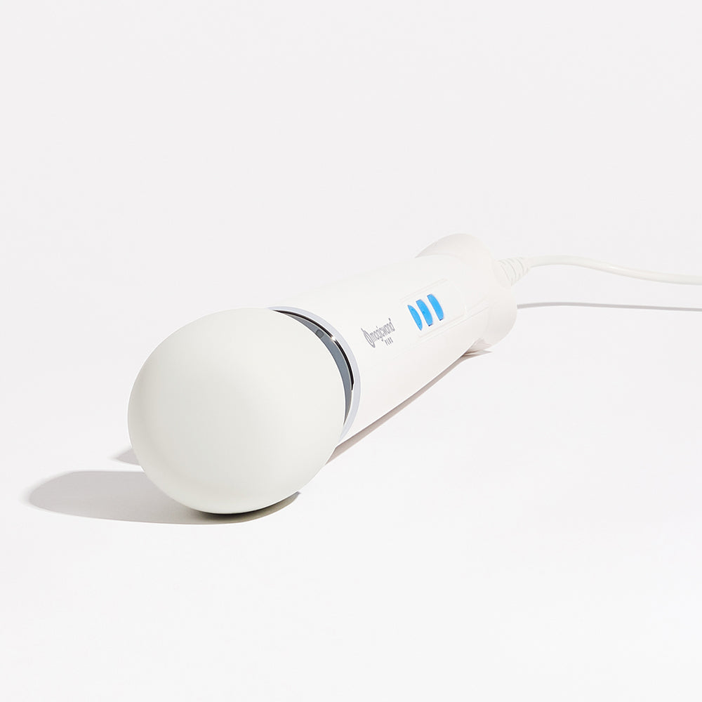 White handheld massager wand with round padded head and blue power indicator on handle.