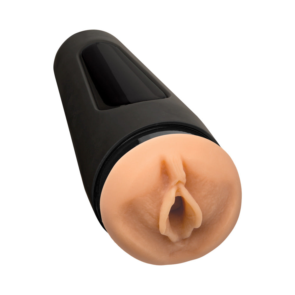 Close-up of tan realistic internal opening inside a black outer housing