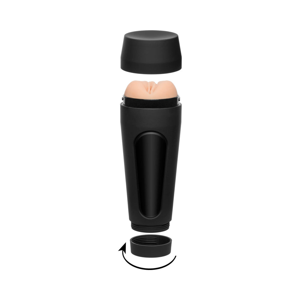 Black handheld device with tan internal insert visible at the top