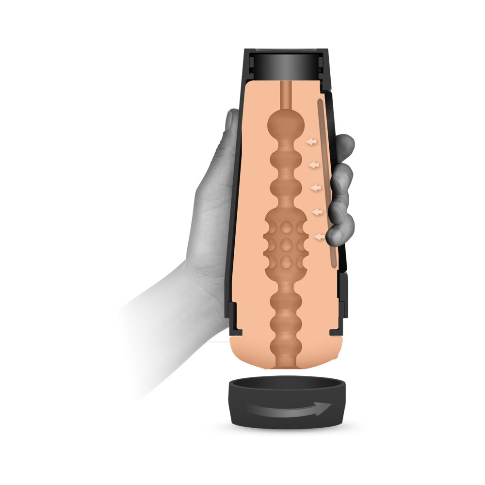 Black stroker device with removable inner sleeve shown in cross-section