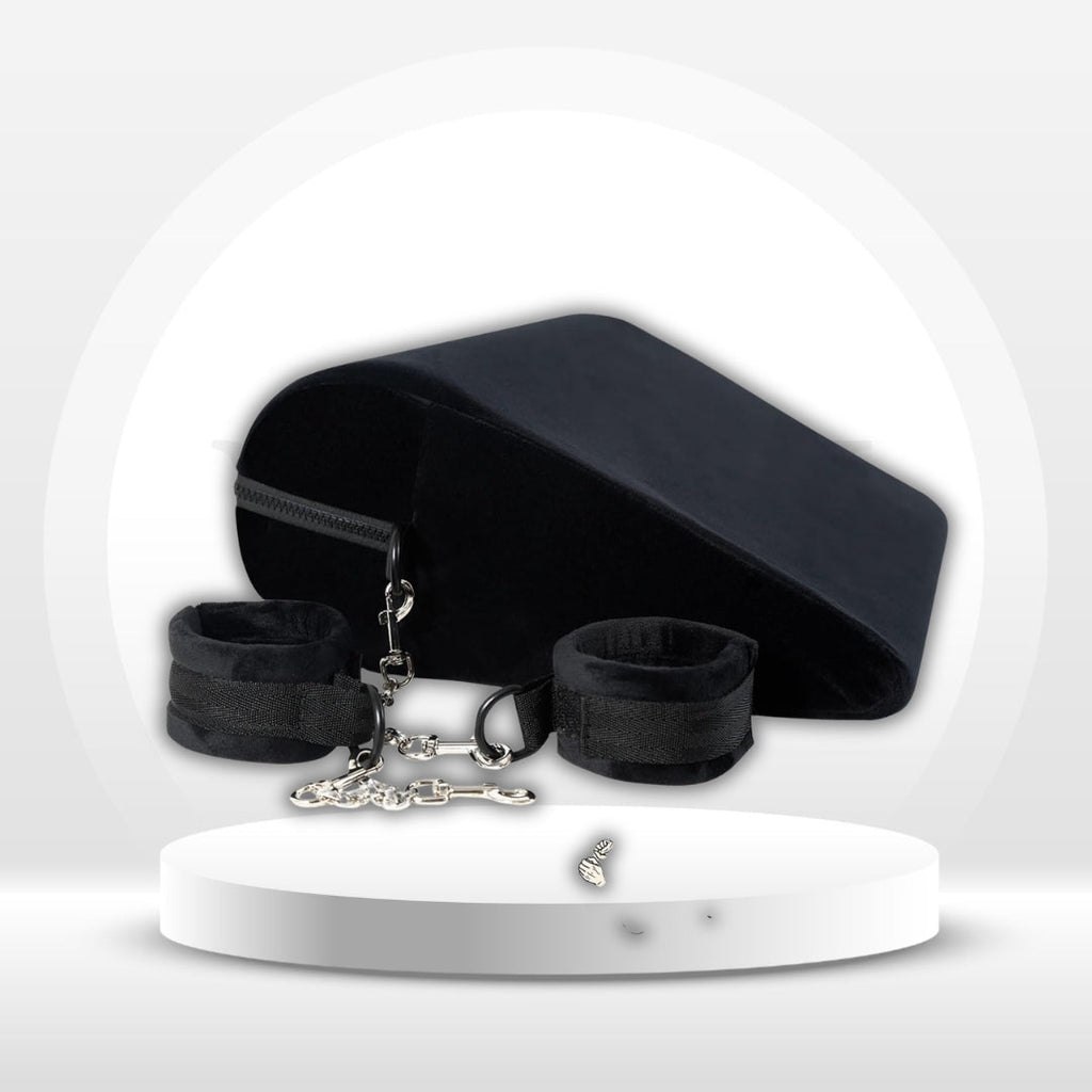 Black positioning pillow set with detachable cuffs, chain links, and metal clips
