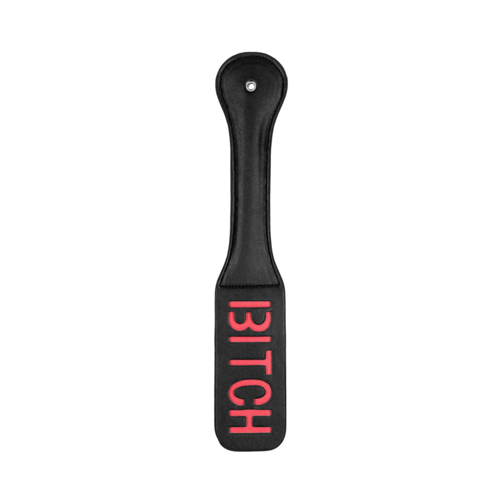 Black paddle hairbrush with red "Bitch" text on handle