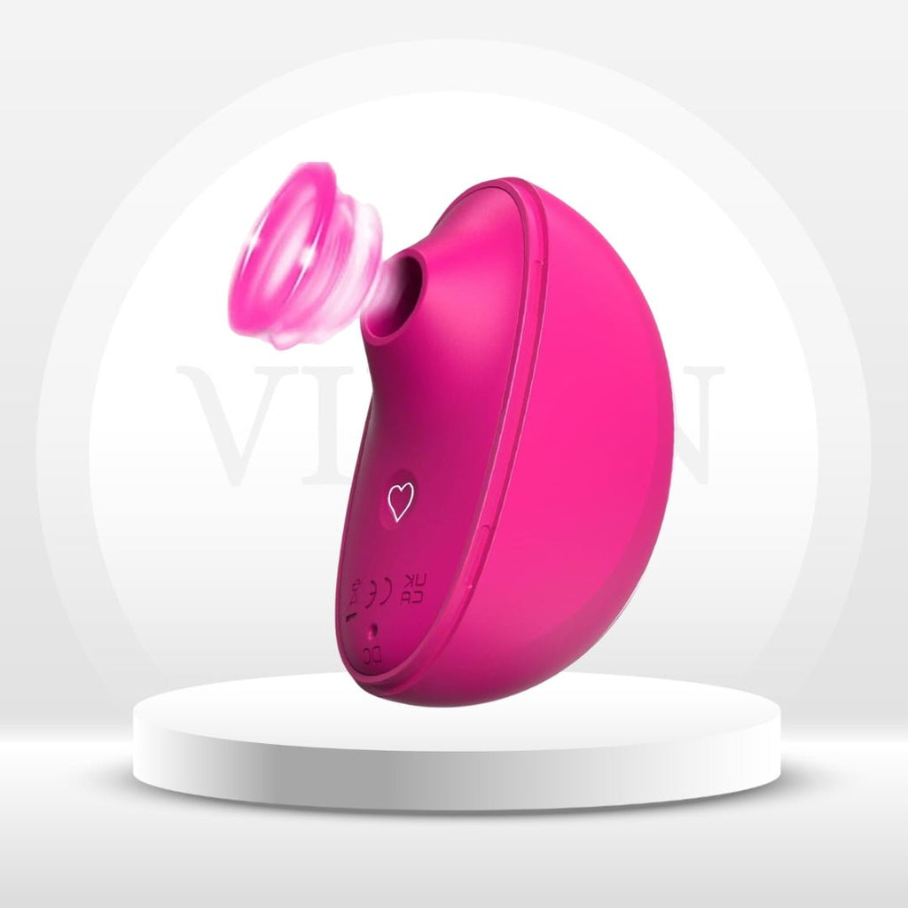 Rose-pink air-pulse stimulator with curved body and small suction cup attachment.