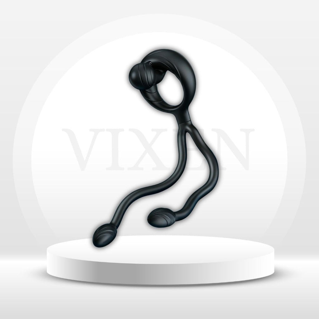 Black curved dual-bullet massager with two rounded vibrating tips on a stand