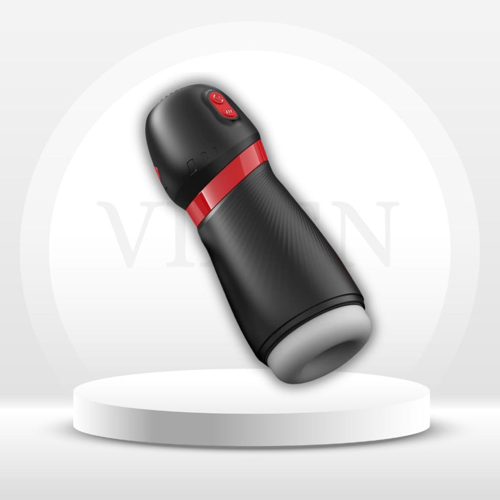 Black suction stroker with red control button, red ring, textured handle, and white suction cup
