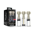 Temptasia boxed set with three clear cylinder twist suction devices and pale silicone heads.