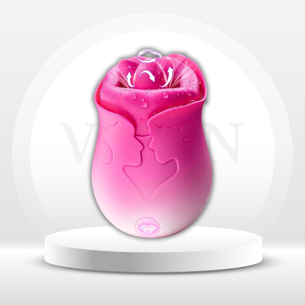 Pink handheld pleasure stimulator with textured silicone surface, shown on stand