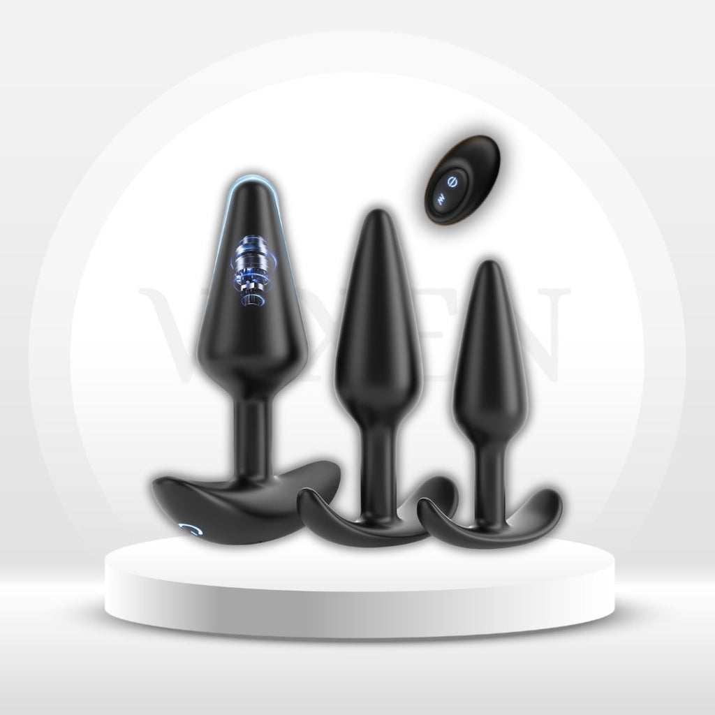 3-piece velvet training set: three black silicone butt plugs with remote fob on stand
